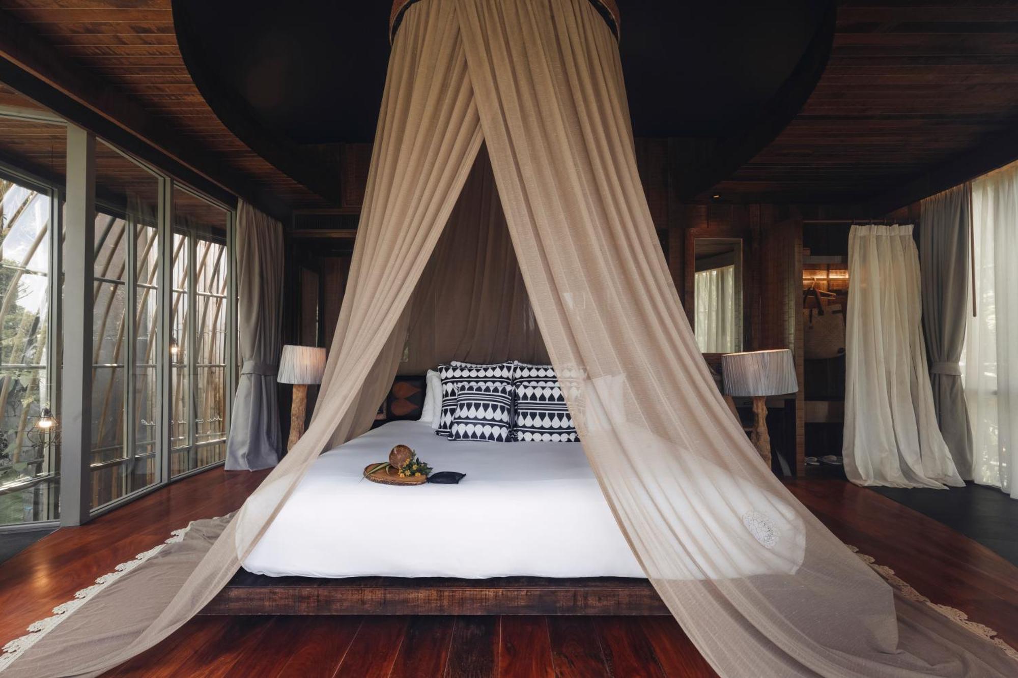 Hotel Keemala Kamala Beach Esterno foto A bed with a mosquito net